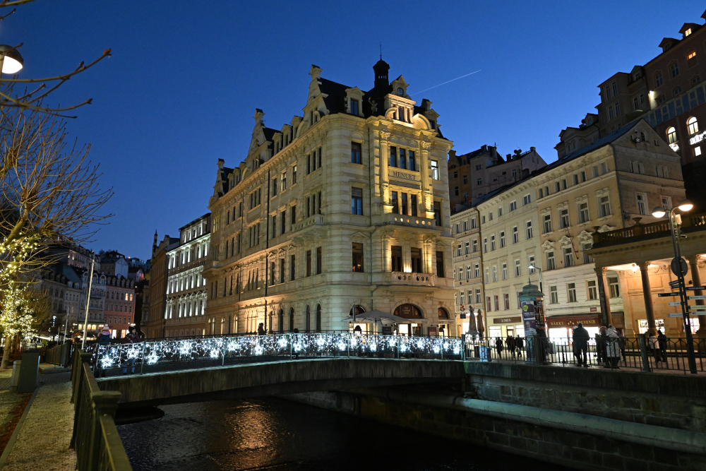 Illuminated bridge in Karlovy Vary in Christmass time